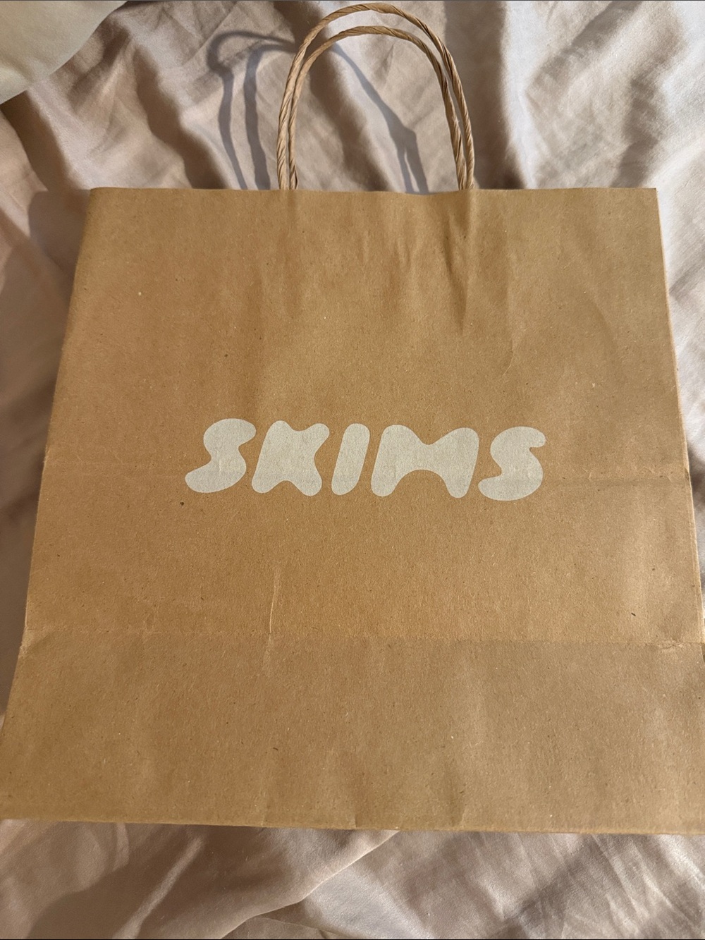 SKIMS Brown Paper Gift Bag with White Logo